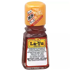 Przejdź do produktu S&B Japoński Olej Chilli z Sezamem LA YU Rayu 33ml do ramen gyoza Tofu